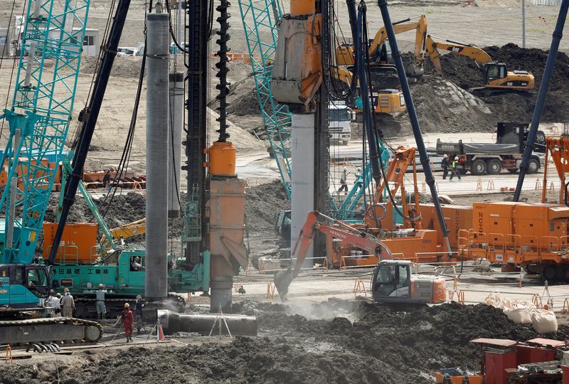 &copy; Reuters. FILE PHOTO: Heavy machines are seen at a construction site in Tokyo, Japan June 8, 2018. REUTERS/Issei Kato