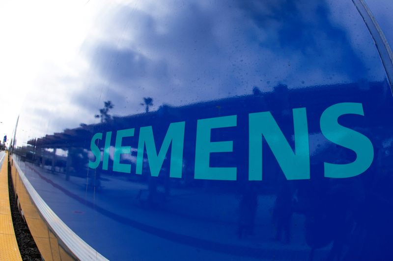 &copy; Reuters. FILE PHOTO: The Siemens logo is shown on a new Siemens Charger locomotive as it comes into service as part of the Coaster Fleet in Oceanside, California, U.S., February 8, 2021. REUTERS/Mike Blake/File Photo