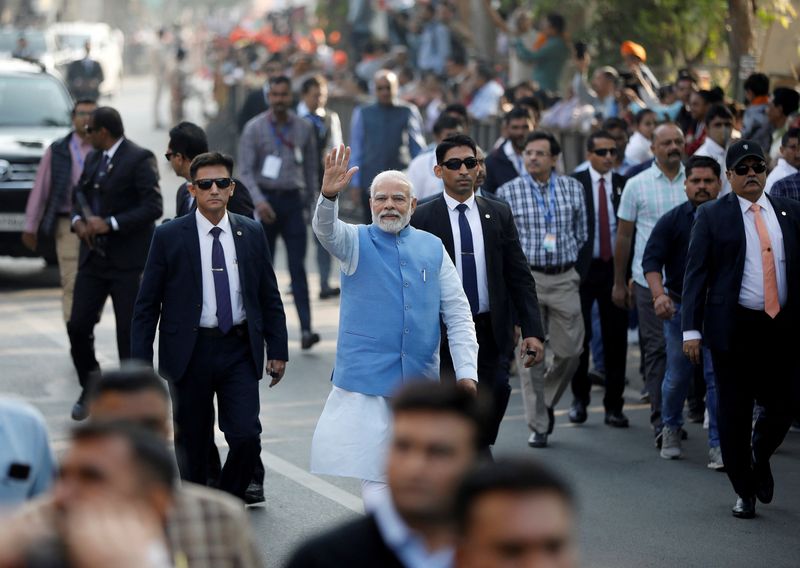 &copy; Reuters. FILE PHOTO: India's Prime Minister Narendra Modi waves to his supporters as he arrives to cast his vote during the second and last phase of Gujarat state assembly elections in Ahmedabad, India, December 5, 2022. REUTERS/Amit Dave