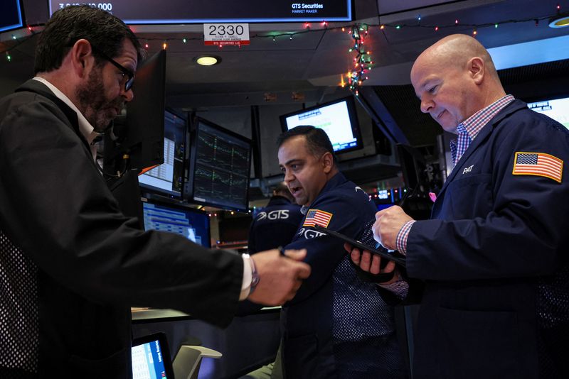 &copy; Reuters. FILE PHOTO: Traders work on the floor of the New York Stock Exchange (NYSE) in New York City, U.S., December 7, 2022.  REUTERS/Brendan McDermid