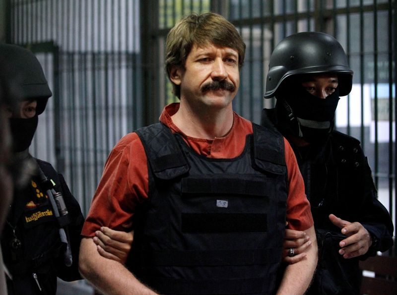 &copy; Reuters. FILE PHOTO: Suspected Russian arms dealer Viktor Bout is escorted by members of a special police unit after a hearing at a criminal court in Bangkok October 5, 2010. REUTERS/Sukree Sukplang