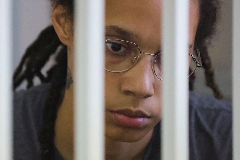 &copy; Reuters.  FILE PHOTO: U.S. basketball player Brittney Griner, who was detained at Moscow's Sheremetyevo airport and later charged with illegal possession of cannabis, sits inside a defendants' cage before the court's verdict in Khimki outside Moscow, Russia August