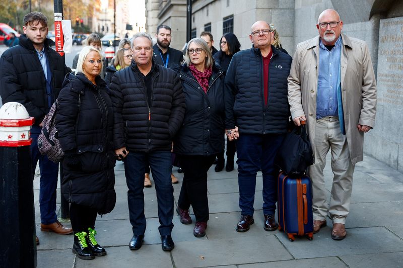 &copy; Reuters. Harry Dunn's mother, Charlotte Charles and her husband Bruce stand with Harry Dunn's father, Tim Dunn, his partner Tracey and Radd Seiger, their adviser and spokesperson, as they attend the Old Bailey for the sentencing of Anne Sacoolas, the wife of a U.S