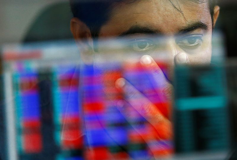 &copy; Reuters. A broker reacts while trading at his computer terminal at a stock brokerage firm in Mumbai, India, November 9, 2016. REUTERS/Danish Siddiqui/Files