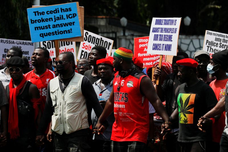 &copy; Reuters. FILE PHOTO: Ghanaians march in the streets on the second day of protests over recent economic hardships, in Accra, Ghana, June 29, 2022. REUTERS/Francis Kokoroko/File Photo
