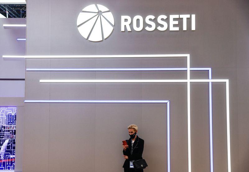 &copy; Reuters. FILE PHOTO: A participant stands next to the stand of Russian grid operator Rosseti at the St. Petersburg International Economic Forum (SPIEF) in Saint Petersburg, Russia June 15, 2022. REUTERS/Maxim Shemetov