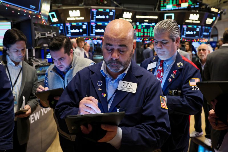 &copy; Reuters. FILE PHOTO: Traders work on the floor of the New York Stock Exchange (NYSE) in New York City, U.S., December 7, 2022.  REUTERS/Brendan McDermid