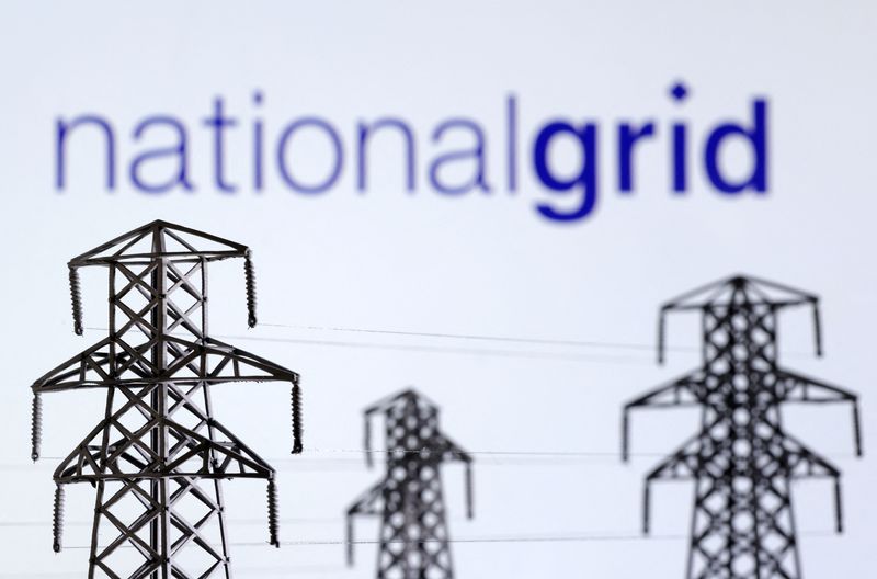&copy; Reuters. Electric power transmission pylon miniatures and National Grid logo are seen in this illustration taken, December 9, 2022. REUTERS/Dado Ruvic/Illustration