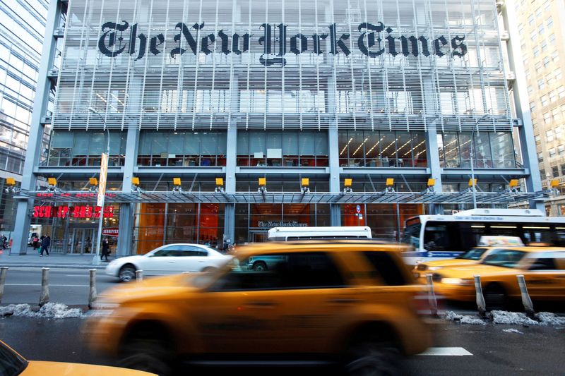 &copy; Reuters. FILE PHOTO: Vehicles drive past the New York Times headquarters in New York March 1, 2010. REUTERS/Lucas Jackson///File Photo