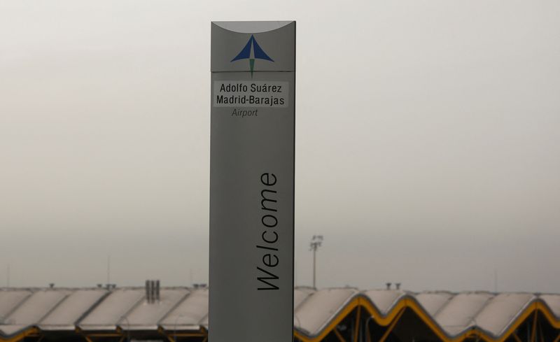 © Reuters. FILE PHOTO: The logo of Spanish airports operator Aena is seen on the top of a welcoming sign outside Adolfo Suarez Barajas airport in Madrid, Spain, March 9, 2016. REUTERS/Sergio Perez/File Photo