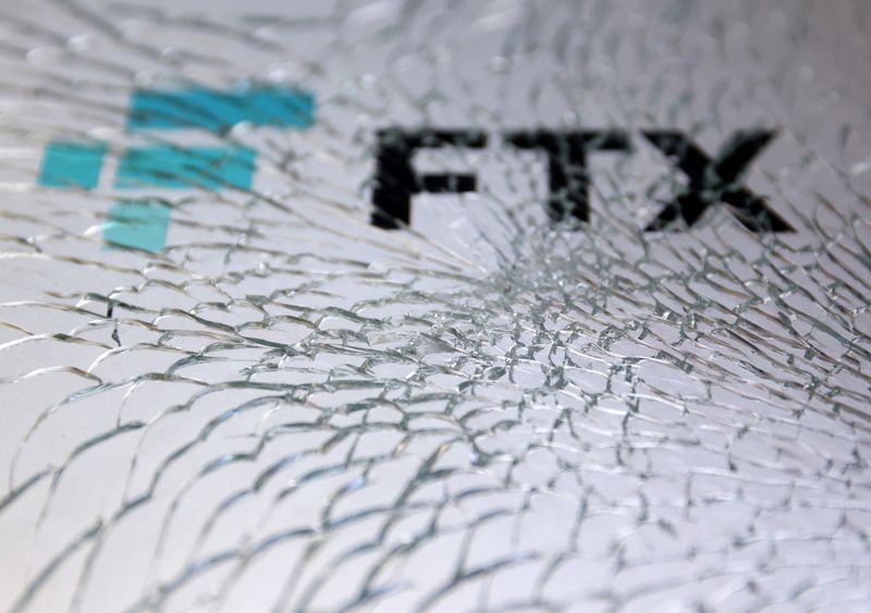 &copy; Reuters. FILE PHOTO: An FTX logo is seen through broken glass in this illustration taken, December 13, 2022 REUTERS/Dado Ruvic/Illustration