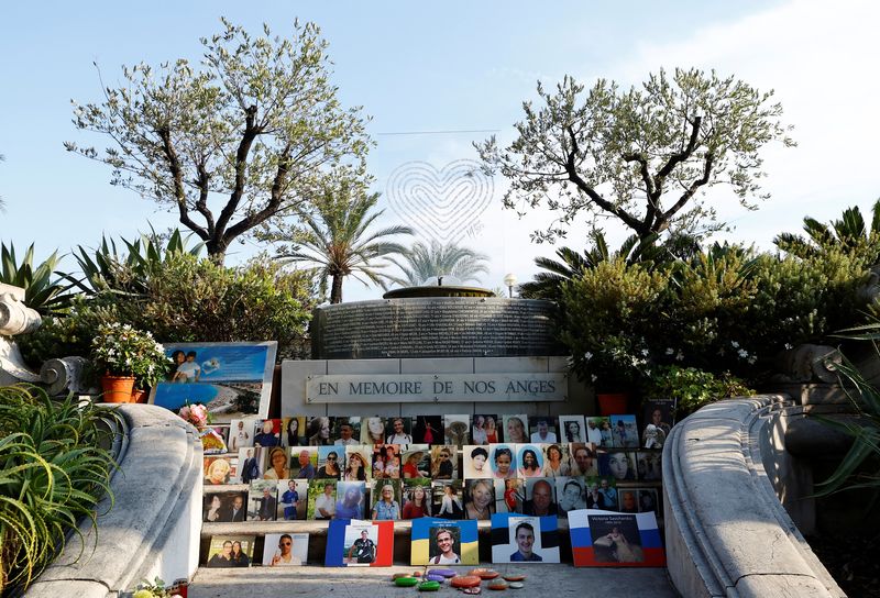 &copy; Reuters. FILE PHOTO: Photos and names of the 86 victims of the July 14, 2016 truck attacks are seen on a memorial on the Promenade des Anglais in Nice, France, August 29, 2022.  REUTERS/Eric Gaillard