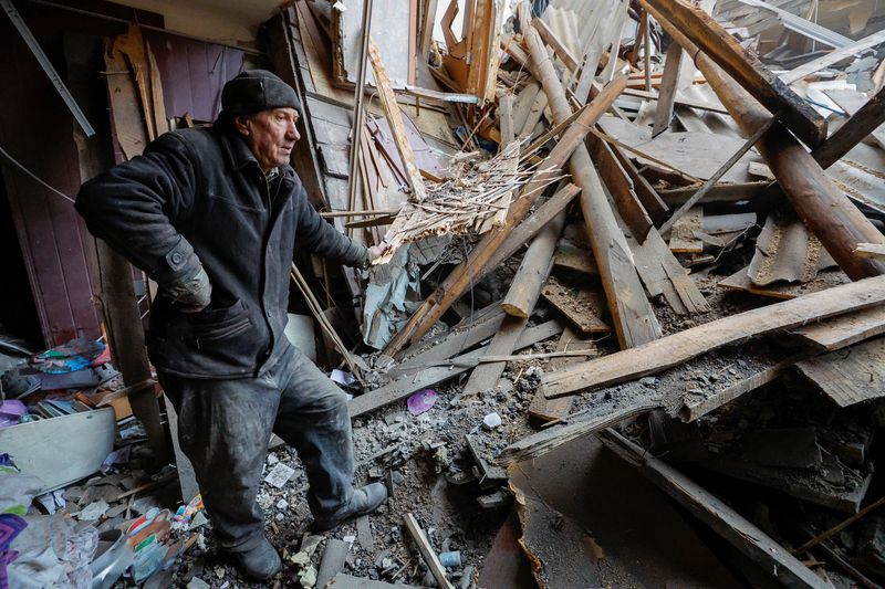 &copy; Reuters. FILE PHOTO: Local resident Sergei stands amid debris of his apartment in a building heavily damaged in recent shelling in the course of Russia-Ukraine conflict in Horlivka (Gorlovka) in the Donetsk region, Russian-controlled Ukraine, December 13, 2022. RE