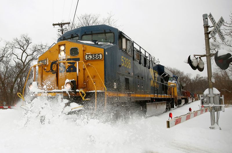 &copy; Reuters. FILE PHOTO: A CSX freight train blasts through high snow at a crossing in Silver Spring, Maryland, February 13, 2014. REUTERS/Gary Cameron/