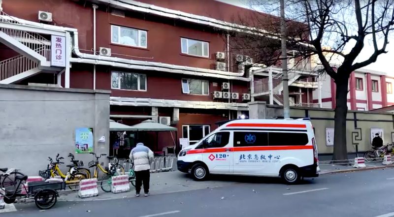 &copy; Reuters. An ambulace arrives at a fever clinic at Chaoyang Hospital in Beijing, China December 13, 2022, in this screen grab taken from a Reuters TV video. REUTERS TV via REUTERS