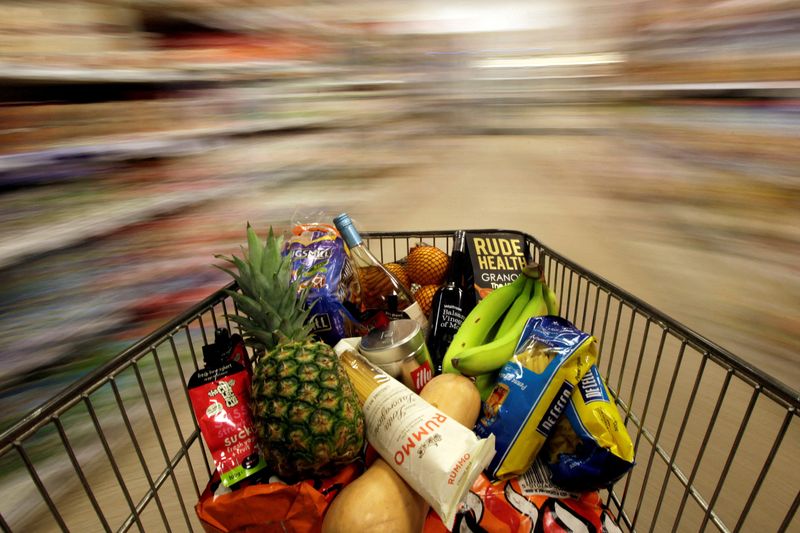 &copy; Reuters. FILE PHOTO: A shopping trolley is pushed around a supermarket in London, Britain May 19, 2015. REUTERS/Stefan Wermuth
