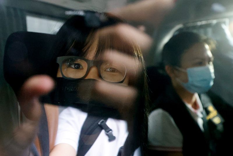 &copy; Reuters. FILE PHOTO: Hong Kong Alliance in Support of Patriotic Democratic Movements of China Vice-Chairwoman Tonyee Chow Hang-tung is seen inside a vehicle after being detained in Hong Kong, China, September 8, 2021. REUTERS/Tyrone Siu  