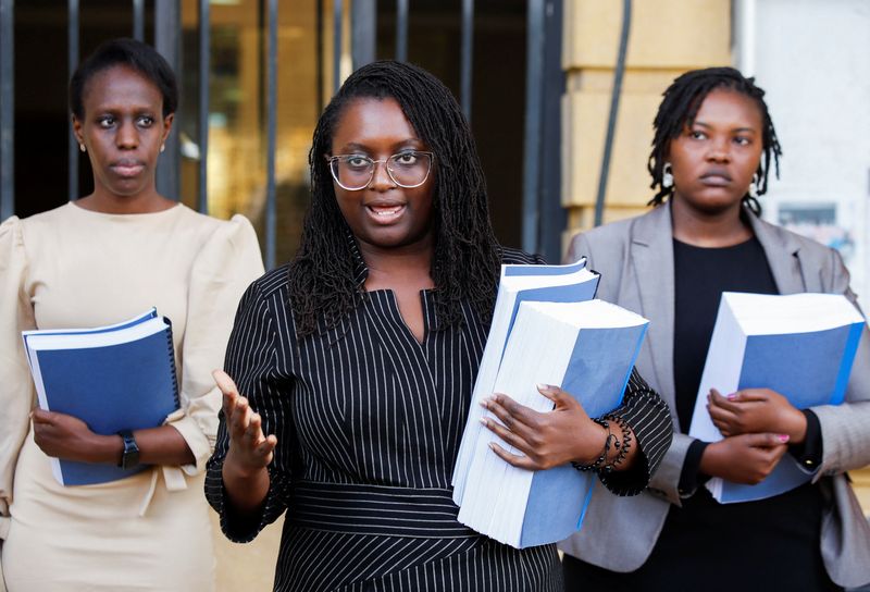 © Reuters. Kenyan lawyers Valerie Omari, Mercy Mutemi and Damaris Mutemi addresses a news conference after filing a lawsuit on behalf of their clients accusing Meta of enabling hateful posts on Ethiopia conflict at the Milimani Law Courts in Nairobi, Kenya December 14, 2022. REUTERS/Monicah Mwangi