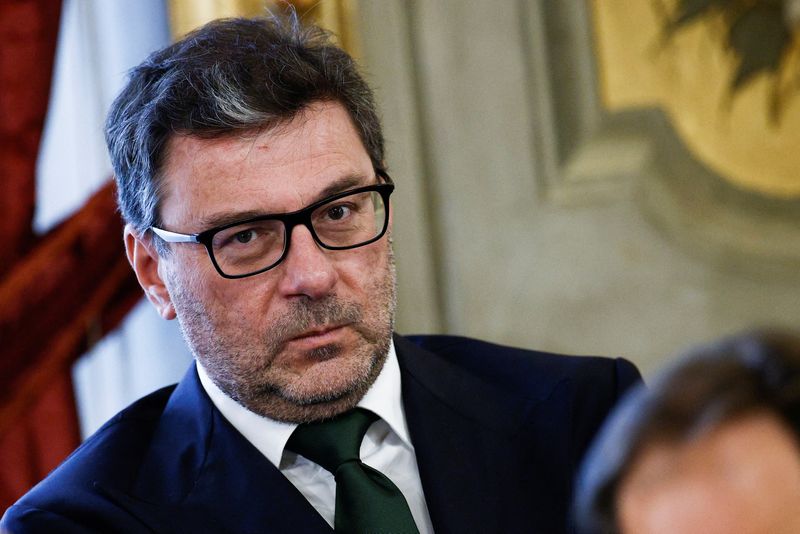 &copy; Reuters. FILE PHOTO: Italy's newly appointed Economy Minister Giancarlo Giorgetti looks on during the swearing-in ceremony at Quirinale Presidential Palace in Rome, Italy October 22, 2022. REUTERS/Guglielmo Mangiapane