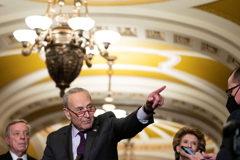 © Reuters. FILE PHOTO: U.S. Senate Majority Leader Chuck Schumer (D-NY) speaks to reporters after the weekly senate party caucus luncheons at the U.S. Capitol in Washington, U.S., December 13, 2022. REUTERS/Sarah Silbiger/File Photo