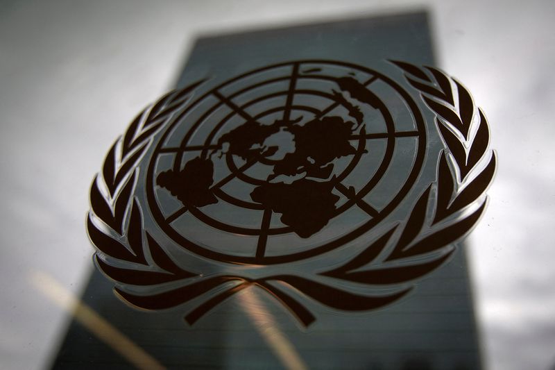 &copy; Reuters. FILE PHOTO: The United Nations headquarters building is pictured though a window with the UN logo in the foreground in the Manhattan borough of New York August 15, 2014.    REUTERS/Carlo Allegri