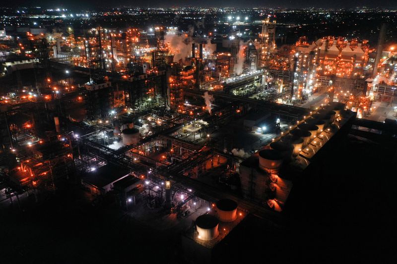 &copy; Reuters. FILE PHOTO: A nighttime view of the Torrance Refinery, an oil refinery operated by PBF Energy, in Torrance, California, U.S., March 10, 2022. Picture taken March 10, 2022. Picture taken with a drone. REUTERS/Bing Guan/File Photo