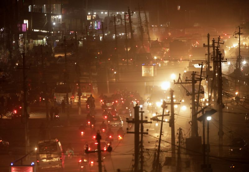 &copy; Reuters. FILE PHOTO: A general view of vehicular movement during an evening traffic in Kathmandu, Nepal December 21, 2020. REUTERS/Navesh Chitrakar