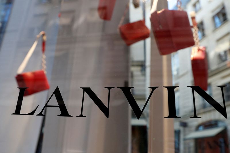 &copy; Reuters. FILE PHOTO: The logo of Lanvin, luxury clothing and accessories, is seen on a French fashion house Lanvin store window in Paris, France February 22, 2018. REUTERS/Gonzalo Fuentes/File Photo