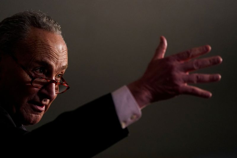 © Reuters. FILE PHOTO: U.S. Senate Majority Leader Chuck Schumer (D-NY) speaks to reporters following the Senate Democrats weekly policy lunch on Capitol Hill in Washington, U.S., February 1, 2022. REUTERS/Elizabeth Frantz/File Photo