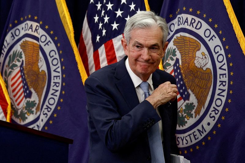 &copy; Reuters. FILE PHOTO: Federal Reserve Board Chairman Jerome Powell leaves after a news conference following the announcement that the Federal Reserve raised interest rates by half a percentage point, at the Federal Reserve Building in Washington, U.S., December 14,