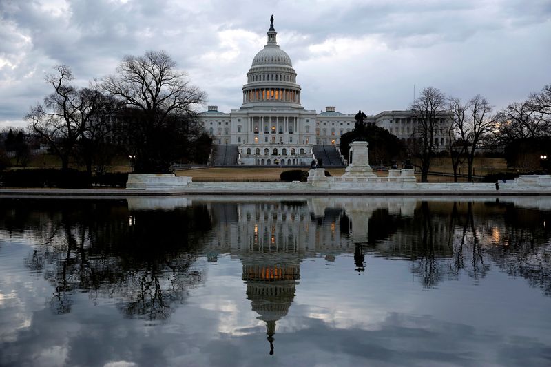 &copy; Reuters. FILE PHOTO: Clouds pass over the U.S. Capitol in Washington, U.S., January 22, 2018. REUTERS/Joshua Roberts/File Photo