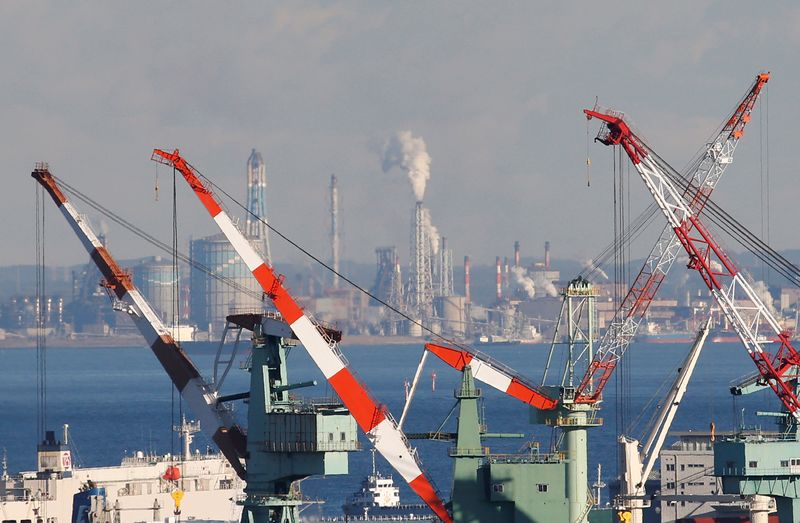 &copy; Reuters. FILE PHOTO: Chimneys and cranes are seen at an industrial area in Yokohama, Japan, January 16, 2017. Picture taken January 16, 2017.    REUTERS/Kim Kyung-Hoon