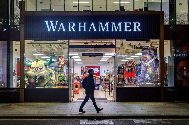 &copy; Reuters. FILE PHOTO: A person walks past a Warhammer store, a brand owned by Games Workshop, in London, Britain, November 17, 2021. REUTERS/May James