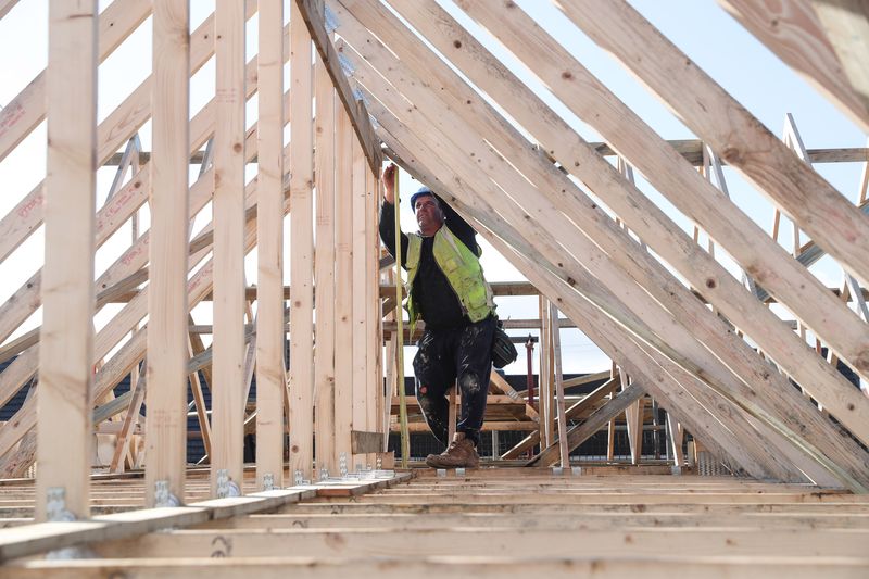 &copy; Reuters. A builder working for Taylor Wimpey builds a roof on an estate in Aylesbury, Britain, February 7, 2017.  REUTERS/Eddie Keogh/Files
