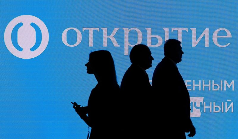 &copy; Reuters. FILE PHOTO: The logo of Russian bank Otkritie is seen on a board at the St. Petersburg International Economic Forum (SPIEF), Russia, June 6, 2019. REUTERS/Maxim Shemetov/File Photo