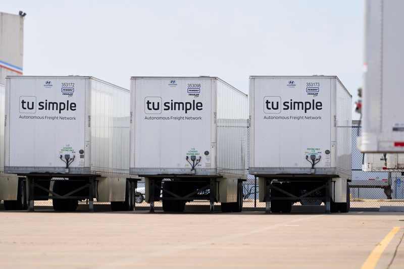 &copy; Reuters. FILE PHOTO: TuSimple truck-trailers are parked at their facility at AllianceTexas, a 27,000 acre business complex boasting some of the country’s largest freight operations, in Fort Worth, Texas, U.S. May 18, 2022. Picture taken May 18, 2022.  REUTERS/Co