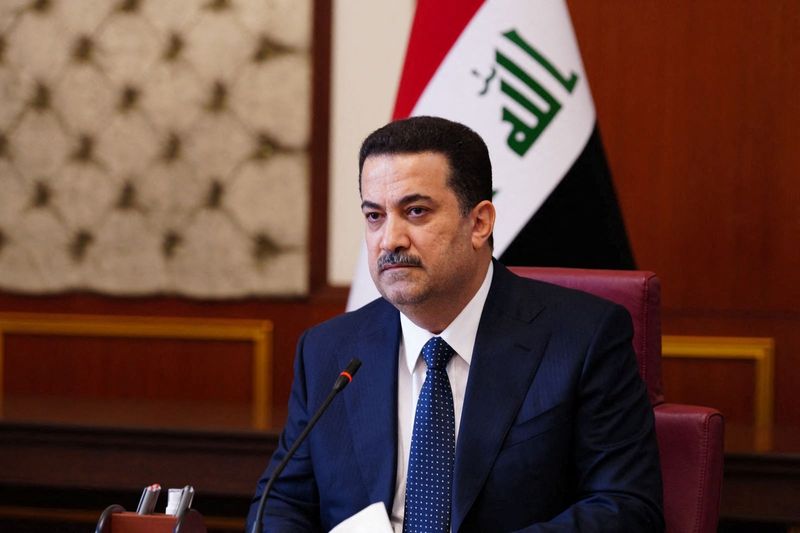 &copy; Reuters. رئيس الوزراء العراقي محمد شياع السوداني خلال اجتماع في بغداد يوم 28 أكتوبر تشرين الأول 2022. صورة لرويترز من طرف ثالث.