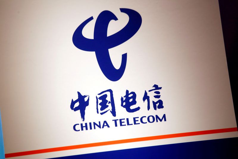 © Reuters. FILE PHOTO: The company logo of China Telecom is displayed at a news conference in Hong Kong, China August 20, 2018.   REUTERS/Bobby Yip