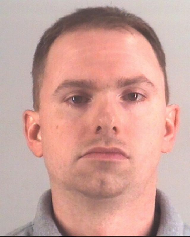 &copy; Reuters. FILE PHOTO: Fort Worth Police Department officer Aaron York Dean is seen in a booking photo at the Tarrant County Jail in Fort Worth, Texas, U.S. October 14, 2019.  Tarrant County Jail/Handout via REUTERS. 