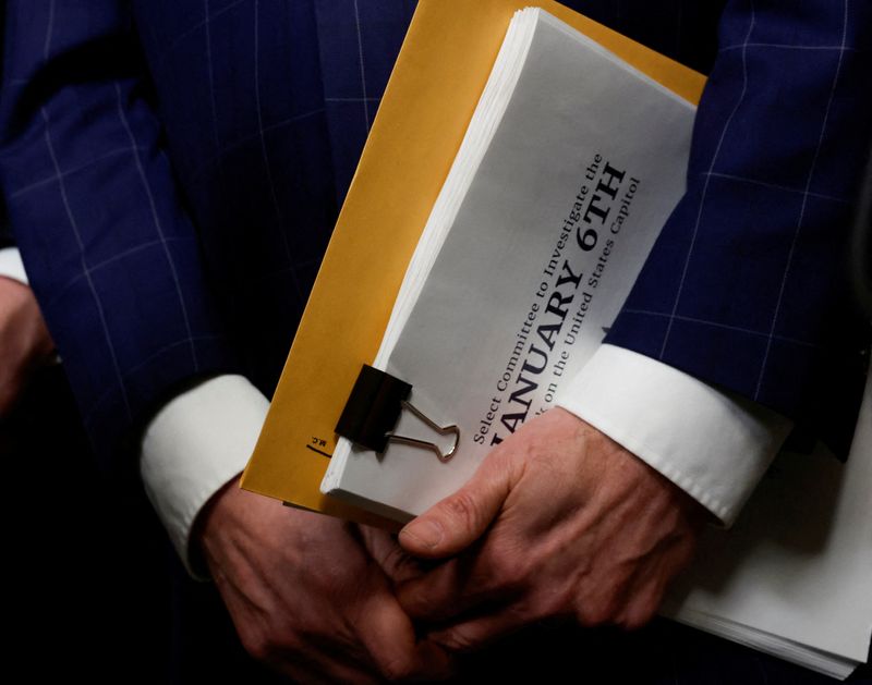 © Reuters. FILE PHOTO: U.S. Rep. Jamie Raskin (D-MD) carries the comittee's final report as he departs after the final public meeting of the U.S. House Select Committee investigating the January 6 Attack on the U.S. Capitol, on Capitol Hill in Washington, U.S., December 19, 2022. REUTERS/Jonathan Ernst