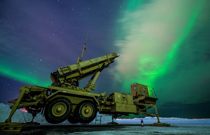&copy; Reuters. FILE PHOTO: The northern lights glow behind a Patriot missile M903 launcher station assigned to 5th Battalion, 52nd Air Defense Artillery Regiment, during Exercise ARCTIC EDGE 2022 at Eielson Air Force Base, Alaska, March 5, 2022. U.S. Air Force/Senior Ai