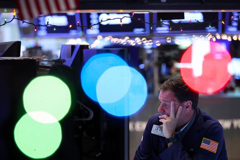 &copy; Reuters. A trader works on the trading floor at the New York Stock Exchange (NYSE) in New York City, U.S., December 14, 2022. REUTERS/Andrew Kelly