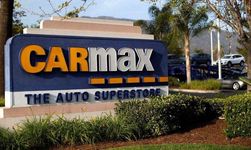 Used car retailer CarMax posts falling profits, suspends share buybacks
