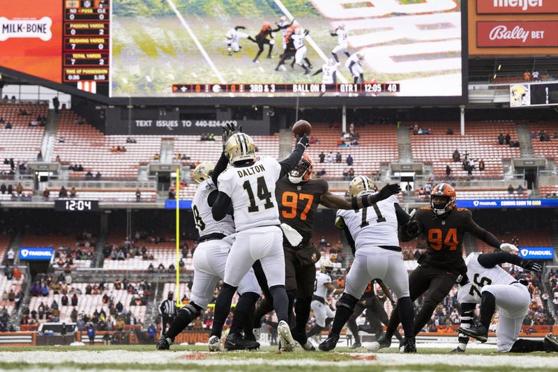 &copy; Reuters. Dec 24, 2022; Cleveland, Ohio, USA; New Orleans Saints quarterback Andy Dalton (14) throws the ball against the Cleveland Browns during the first quarter at FirstEnergy Stadium. Mandatory Credit: Scott Galvin-USA TODAY Sports