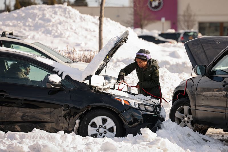 As thaw from Buffalo's deadly blizzard begins, troops check for more victims