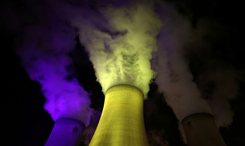 &copy; Reuters. FILE PHOTO: A general view of the Drax Power Station, illuminated in the colours of the Ukrainian flag, in North Yorkshire, Britain April 1, 2022. Picture taken April 1, 2022. REUTERS/Lee Smith/File Photo