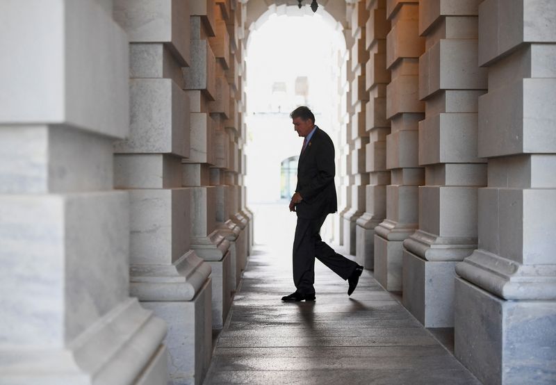 &copy; Reuters. FILE PHOTO: Sen. Joe Manchin (D-WV) leaves the U.S. Capitol in Washington, U.S., September 27, 2022. REUTERS/Mary F. Calvert