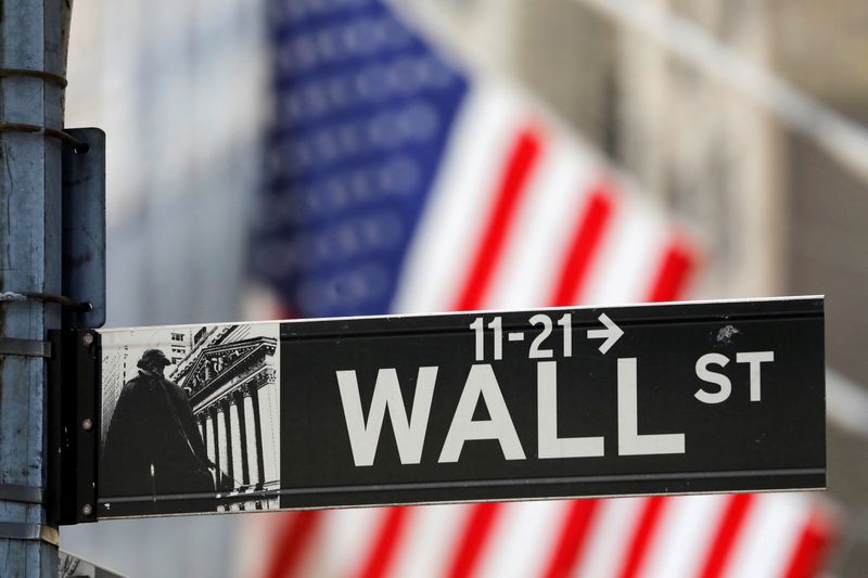 &copy; Reuters. FILE PHOTO: A street sign for Wall Street is seen outside the New York Stock Exchange (NYSE) in New York City, New York, U.S., July 19, 2021. REUTERS/Andrew Kelly/File Photo