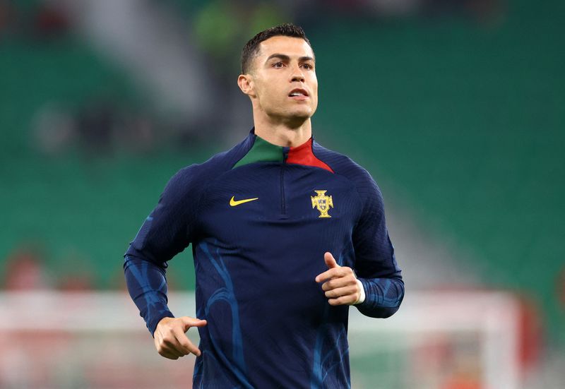 © Reuters. FILE PHOTO: Soccer Football - FIFA World Cup Qatar 2022 - Quarter Final - Morocco v Portugal - Al Thumama Stadium, Doha, Qatar - December 10, 2022 Portugal's Cristiano Ronaldo during the warm up before the match REUTERS/Carl Recine