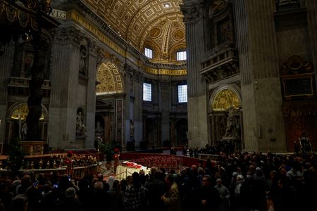 Faithful pay respects to former Pope Benedict in St. Peter's By Reuters